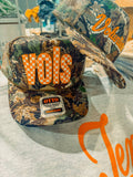 Vols Checkerboard, Tennessee Game Day Trucker Hat: Dark Green/Brown Camo